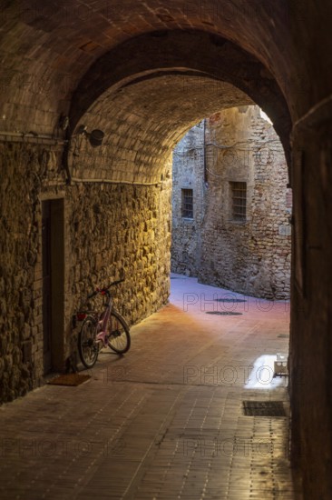 Tunnel in an alley in San Gimignano, Tuscany, Province of Siena, Italy