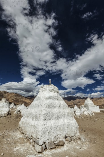 Whitewashed chortens (Tibetan Buddhist stupas) . Nubra valley, Ladakh, India