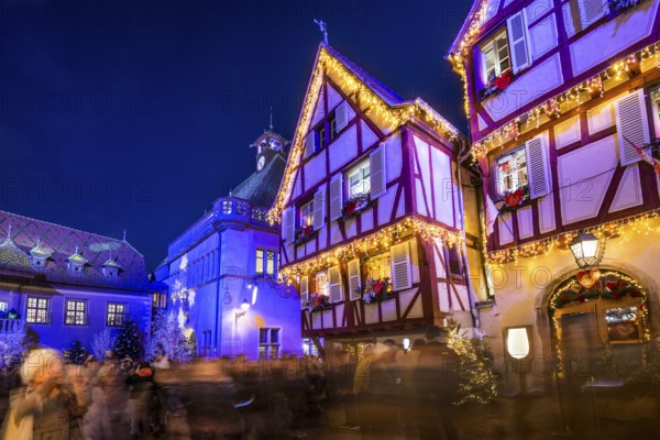 Colourfully illuminated and Christmassy decorated half-timbered houses, old town, blue hour, Colmar, Haut-Rhin department, Alsace, France