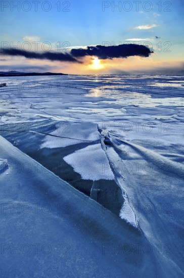 Sunset on ice, Lake Baikal, Olkhon Island, Pribaikalsky National Park, Irkutsk Province, Siberia, Russia
