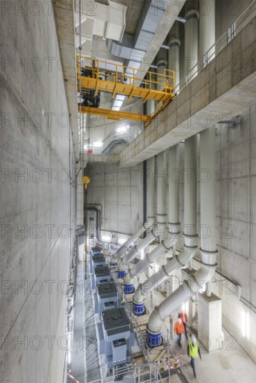 Oberhausen, Ruhr area, North Rhine-Westphalia, Germany - Emscher conversion, new Emscher AKE sewer, here the new Oberhausen pumping station, engine room with the pumps. Germany's largest wastewater pumping station uses 10 pumps to pump up to 16, 500 litres of wastewater per second from a depth of around 40 metres. The ecological conversion of the Emscher system consists of the construction of a central wastewater treatment system in the Ruhr region, the construction of sewers and the renaturalisation of the Emscher and its tributaries
