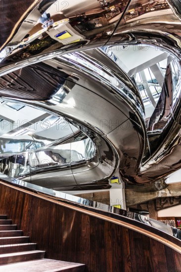 Spectacular double spiral staircase from ground floor to roof terrace, offering breathtaking views over the Maas and Hotel New York, FENIX, museum about migration, in a historic warehouse in Katendrecht, Rotterdam, the Netherlands