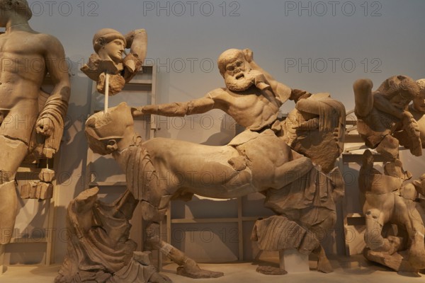 West pediment of the Temple of Zeus, battle between lapiths and centaurs, Greek ancient marble sculptures depicting a mythological battle scene, Olympia Archaeological Museum, Ancient Olympia, Olympia, Peloponnese, Greece