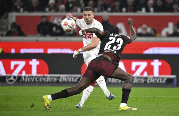 Duel, action Ermedin Demirovic VfB Stuttgart (09) against Castello Lukeba RasenBallsport RB Leipzig RBL (23) Soccer Bundesliga, MHPArena, MHP Arena Stuttgart, Baden-Württemberg, Germany