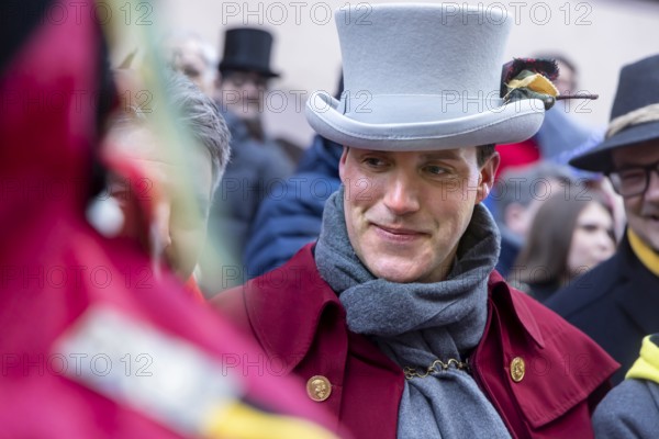 The highlight of the Swabian-Alemannic carnival is the fool's jump in Rottweil. Around 4000 fools jump through the historic Black Gate. Manuel Hagel, CDU parliamentary group leader in the state parliament and leading candidate for the post of prime minister. Rottweil, Black Forest, Baden-Württemberg, Germany