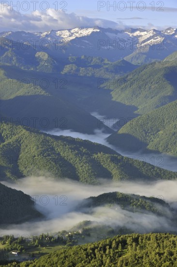 Mist in the valleys at sunrise, seen from the Col de Portel, Pyrenees, France