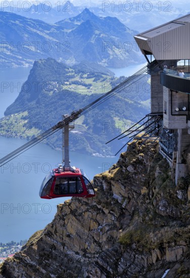 Cable car cabin, Dragon Ride aerial cableway from Fräkmüntegg to Pilatus, entrance to Pilatus Kulm mountain station, Stanser Horn behind, Lake Lucerne, Canton Lucerne, Switzerland