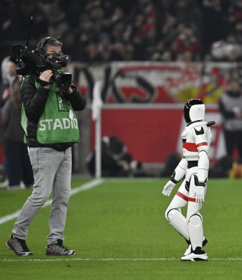 During the DFL and VfB Stuttgart Innovation Matchday, an AI-supported robot hands over the Adidas Derbystar game ball to the mascot Fritzle VfB TV camera Stuttgart soccer Bundesliga, MHPArena, MHP Arena Stuttgart, Baden-Württemberg, Germany