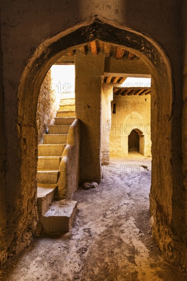 View into an arched vault with staircase, in the largest preserved mud town in Oman, Al Bilaad, Al Bilaad Historical Village, Arabian Peninsula, Sultanate of Oman
