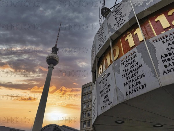 Dramatic sunset with the Berlin TV Tower and the Berlin World Clock in the foreground, Alexanderplatz, Alex, Mitte, Berlin