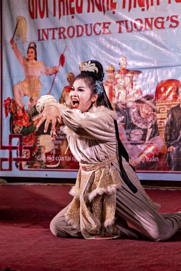 Fascinating stage performance with traditional Viet dance, dramatic expression and colourful costume, traditional theatre in the Old Quarter of Hanoi Vietnam