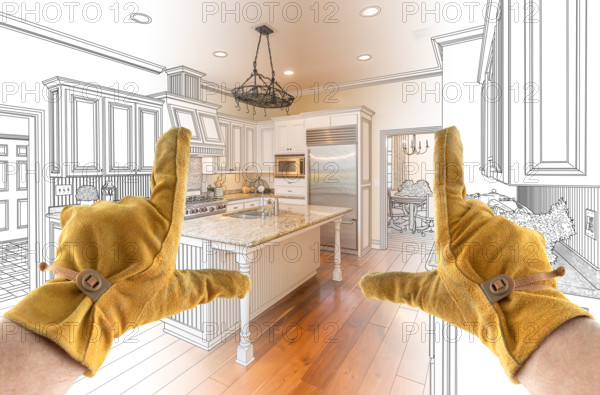 Male Contractor Hands Framing Completed Section of Custom Kitchen Design Drawing