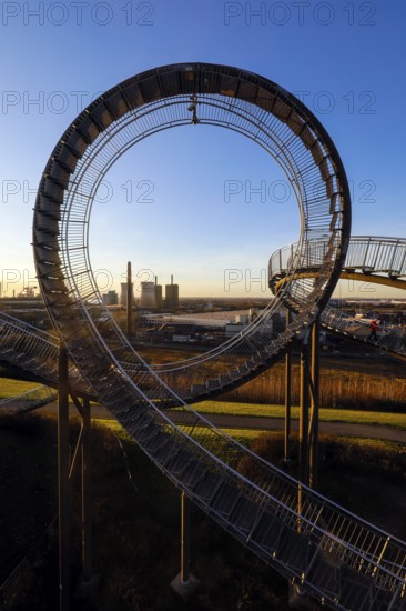 Tiger and Turtle, Magic Mountain is a landmark modelled on a roller coaster, the large sculpture is a walk-in work of art by Heike Mutter and Ulrich Genth, which was developed as part of the Ruhr.2010 Capital of Culture, behind HKM Hüttenwerke Krupp Mannesmann and RWE Power AG, Duisburg, Ruhr area, North Rhine-Westphalia, Germany