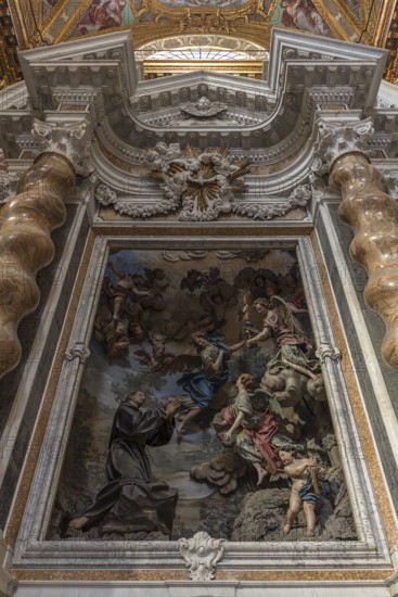 Side altar with a group of sculptures by the Spanish painter San Pasquale Baylon. Painter San Pasquale Baylon, 1540-1592, in the Basilica della Santissima Annunziata del Vastato, Piazza della Nunziata, 4, Genoa. Italy