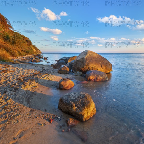 Coastal landscape with large boulders on the Baltic Sea beach in the evening light, Mönchgut Nature Reserve, Groß Zicker, Mönchgut Peninsula, Rügen Island, Mecklenburg-Western Pomerania, Germany