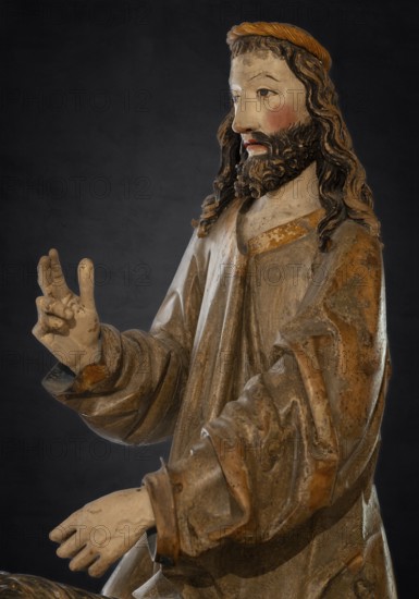 Palm tree donkey, wooden figure from 1470, on a dark background, Franciscan Museum, Villingen, Baden-Württemberg, Germany