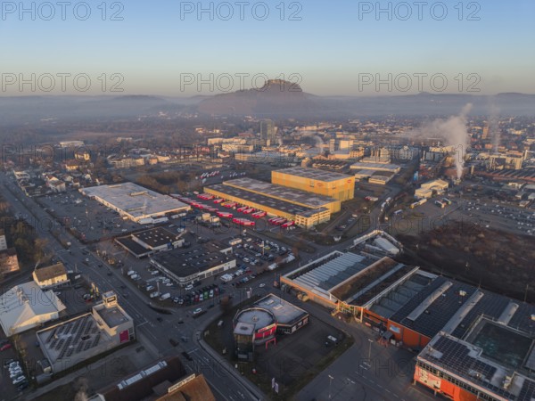 Aerial view of the industrial area of the city of Singen am Hohentwiel, after sunrise, the Hegauberge mountains on the horizon, Konstanz district, Baden-Württemberg, Germany