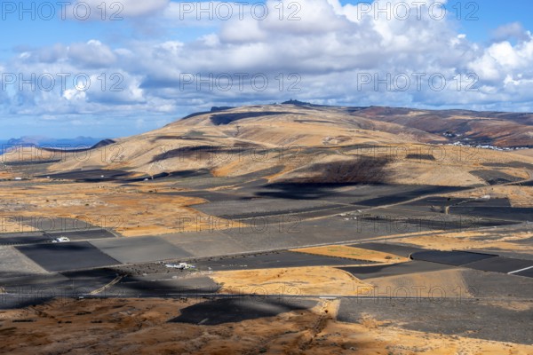 Dry volcanic landscape with fields, Lanzarote, Canary Islands, Spain