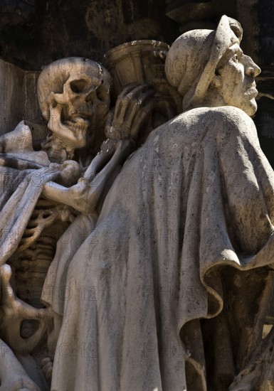 Death behind St. James on the entrance portal of the Marktkirche, artist Jürgen Weber, Hanover, Lower Saxony, Germany