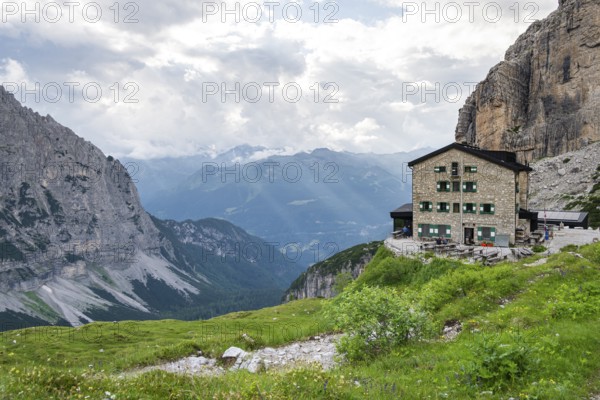 Rifugio Maria E Alberto Ai Brentai mountain hut and rocky peak, Brenta, Trentino, Italy