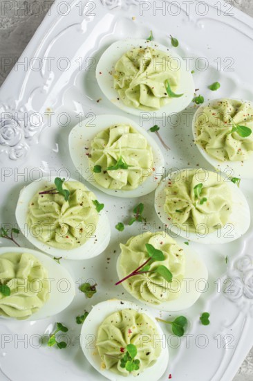 Snack, stuffed eggs with avocado, homemade, no people