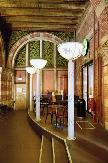 Interior view of coffee at Centraal Station, Central Station with flag, Amsterdam, Netherlands