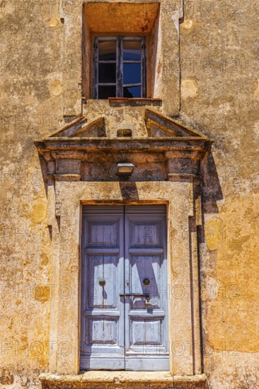 Entrance portal of the Madonna di Monserrato church, near Porto Azzurro, Elba Island, Tuscan Archipelago National Park, Tuscany, Italy