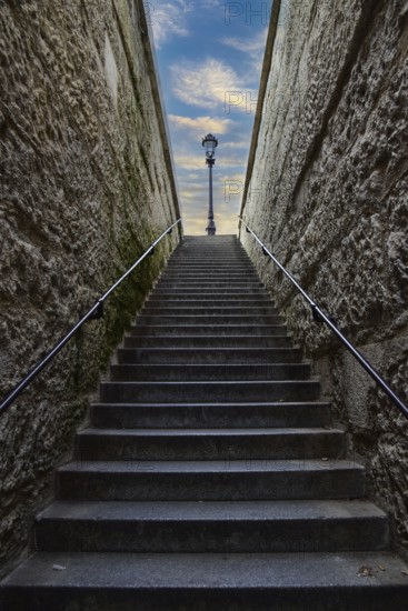 Lantern at the end of a staircase on Ile de la Cité in Paris, France