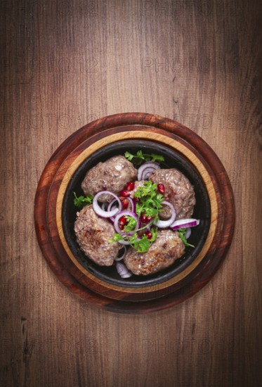 Fried apkhazura, cutlet in a fat grid, spicy, Georgian dish, fried on ketsi, homemade, no people