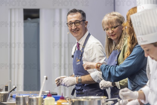 Cem is cooking! DEHOGA Baden-Württemberg event with candidate for the post of Minister-President, Cem Özdemir. The Green Party candidate is assisted by Beate Gaiser from the Hotel Adler in Freudenstadt, chairwoman of the DEHOGA Freudenstadt district association. INTERGASTRA, leading trade fair for the hotel and catering industry. Stuttgart, Baden-Württemberg, Germany