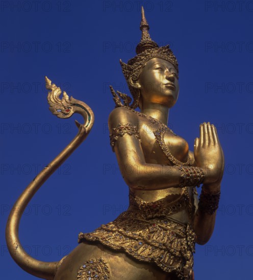 Wat Phra Kaeo, Temple of the Emerald Buddha, gilded statues of mythological creatures of the Himaphan Forest, Bangkok, Thailand