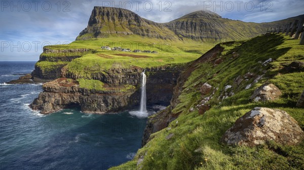 The waterfall with view of Mulafossur, Faroe Islands, Denmark, Faroe Islands, Denmark