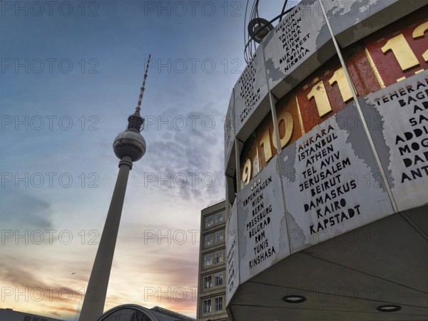 The Berlin TV Tower and the Berlin World Clock under blue sky and sunset, Alexanderplatz, Alex, Mitte, Berlin