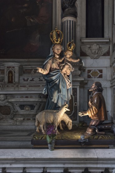 Madonna figure with the infant Jesus in the Basilica della Santissima Annunziata del Vastato, Piazza della Nunziata, 4, Genoa. Italy