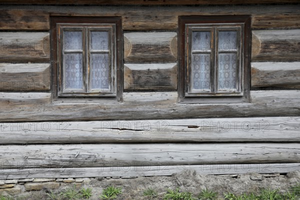Traditional wooden houses in the village of Chocholow, Podhale-style wooden architecture, listed by UNESCO, near Zakopane, Lesser Poland Voivodeship, Poland