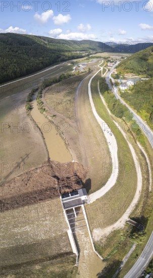 Blockages caused by wood at the Fahrafeld flood defence after a severe storm, Pottenstein, Lower Austria, Austria