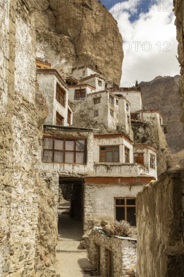 Phugtal Gompa, a stunning Buddhist monastery nestled in the cliffs of Ladakh's Zanskar region, offers a serene retreat with its beautiful stone architecture and panoramic views