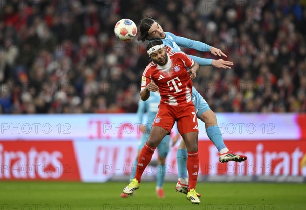 Header duel tackle action Serge Gnabry FC Bayern Munich FCB (07) against Leon Avdullahu TSG 1899 Hoffenheim (07) Soccer Bundesliga, Allianz Arena, Munich, Bavaria, Germany