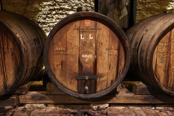 Vladimir Putin wine barrel, detailed view of a wooden barrel in a historic wine cellar, Achaia Clauss winery, Patras, Peloponnese, Greece