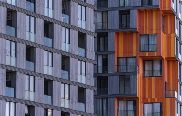 This image captures the essence of modern suburban architecture, featuring a blend of concrete, glass, and metal materials that offer both aesthetic appeal and functionality