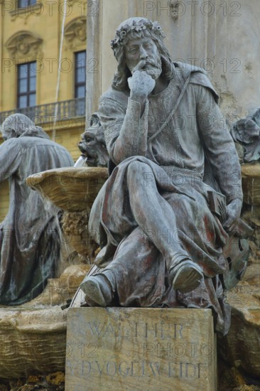 Sculpture of medieval lyricist and poet Walther von der Vogelweide, Frankoniabrunnen built 1894, figure, stone, Residenzplatz, Würzburg, Lower Franconia, Franconia, Bavaria, Germany