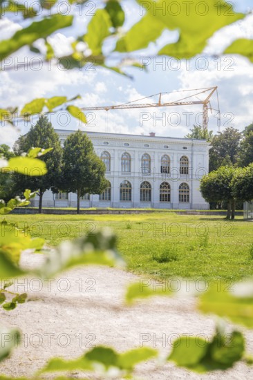 Historic building in a green park, surrounded by trees in the sunshine, Weimar, Germany