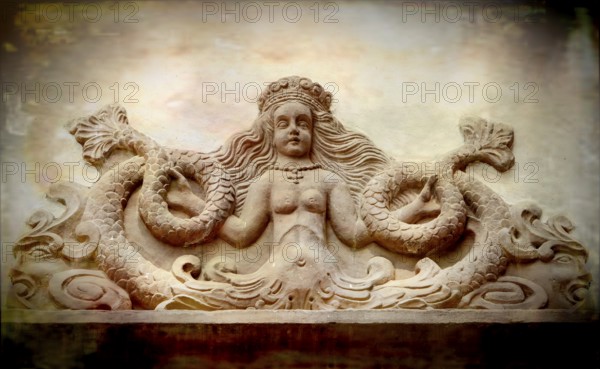 Mythological Mermaid Creature, wall decoration, Welf Castle of Herzberg, Herzberg am Harz, district of Göttingen, Lower Saxony, Germany, digitally edited