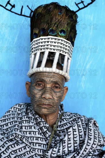 Portrait of a woman from the Ramnami caste (Chhattisgarh, India), As a sign of devotion, Ramnami people used to tattoo their body and their face with the name of Rama, one of the main hindu god. Nowadays, this tradition is disappearing. Indeed, few of them are still tattooed, the younger generation fearing discrimination if they do it. The caste (or sect) is born in the end of the 19th century as a way to protest against the supremacy of the higher classes in the hindu hierarchical system. Comprised of low caste hindus, they dont accept the caste system, they practise a form of bhakti (devotion) dedicated to the god Rama