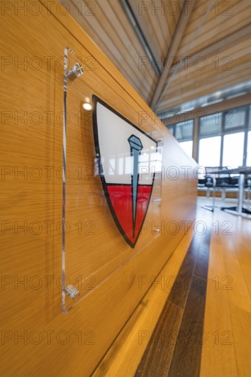 Modern interior decoration with coat of arms on a wooden wall panelling, Nagold Town Hall, Black Forest, Germany