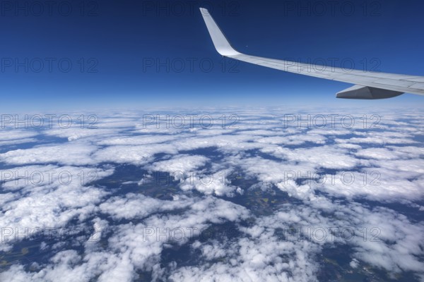 Clouds over Franconia seen from an airplane, Bavaria, Germany