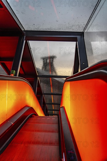 Zeche Zollverein, rainy day, ride on the escalator of the Ruhr Museum, in the coal washing plant, view of the double headframe of shaft XII, through rain-soaked windows, Essen, North Rhine-Westphalia, Germany