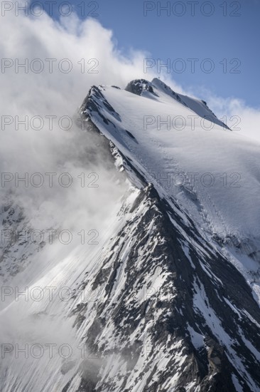 Rocky mountain ridge and glaciated mountain peak Großer Möseler, glacier Furtschaglkees, Berliner Höhenweg, Zillertal Alps, Tyrol, Austria