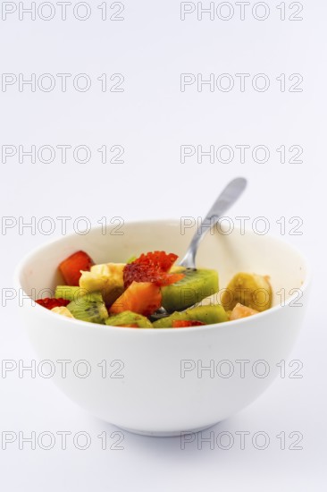 Recipe of a fruit salad with kiwis, strawberries, bananas finished