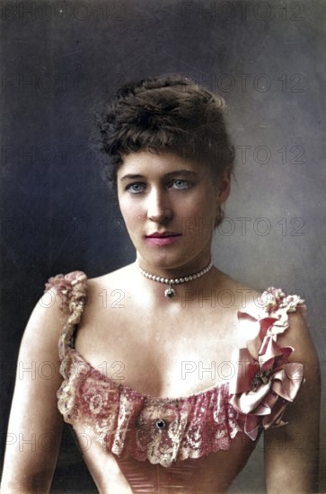 Lillie Langtry (1853-1929, born Emilie Charlotte le Breton), only daughter of the Dean of Jersey, was called the Jersey Lily. English society beauty and actress. Her extramarital lovers included Prince Louis of Battenberg and Albert Edward, Prince of Wales, who later became Edward VII. She became an American citizen in 1887. Woodbury type after a photograph by W & D Downey, ca. 1892, Historic, digitally restored reproduction from a 19th century original, Record date not stated